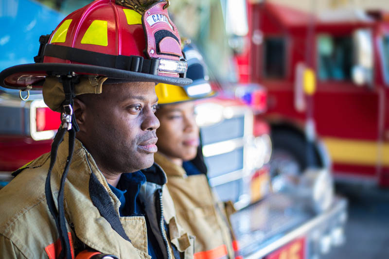 Fireman shown as one example of a first responder and their critical as valued Adult Protective Services (APS) partners