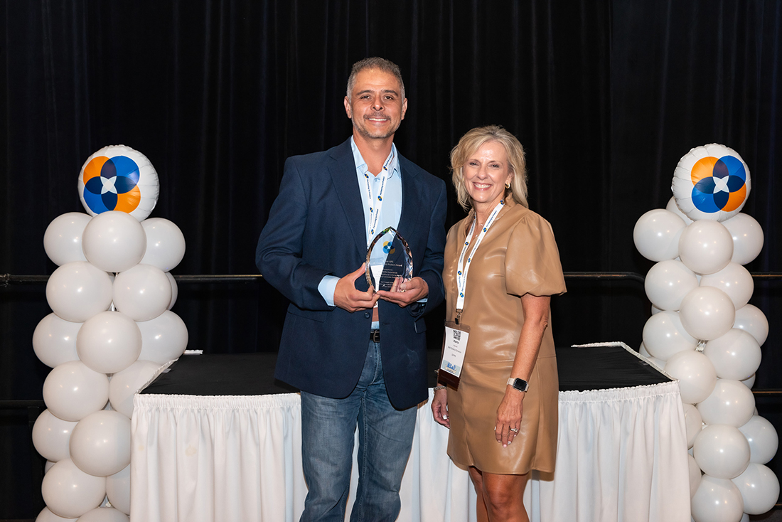 2024 Partnering to Protect Award Winner Representative Michael Cota, Midland Fire Department (left) and Karla Warren, Texas APS Northwest District Director (right)